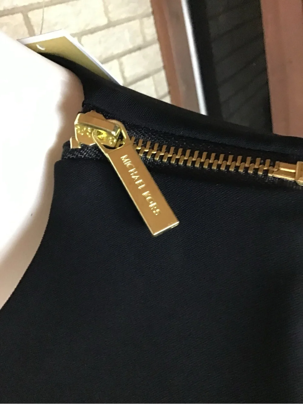 Michael Kors Sleeveless Black Belted Wide-Leg Jumpsuit with Gold Detail